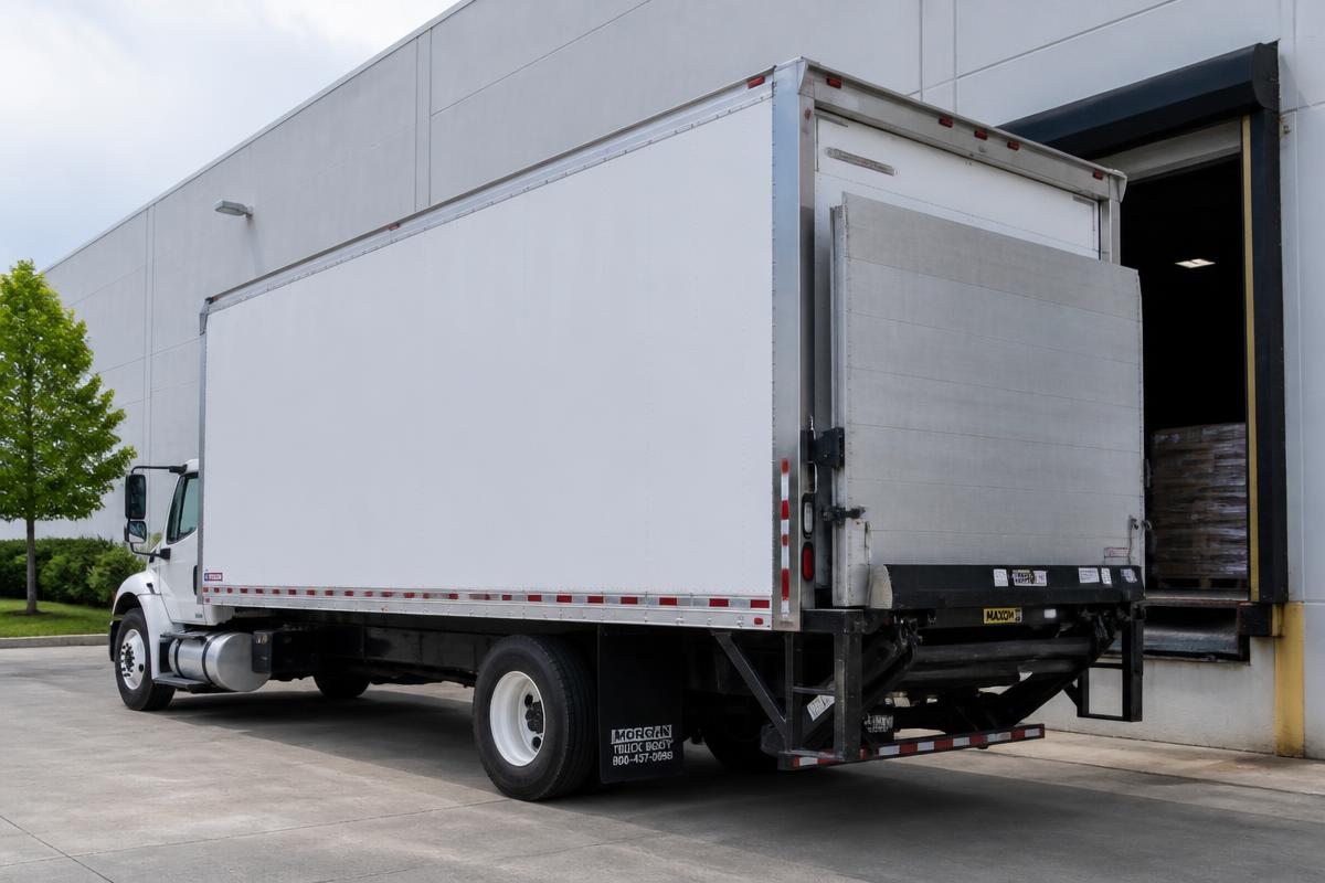 Truck 01 — 26ft box truck with liftgate at a loading dock